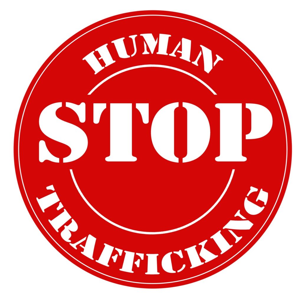 Red stamp with text Stop Human Trafficking.